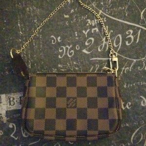 Authentic Louis Vuitton pouchette in Damier